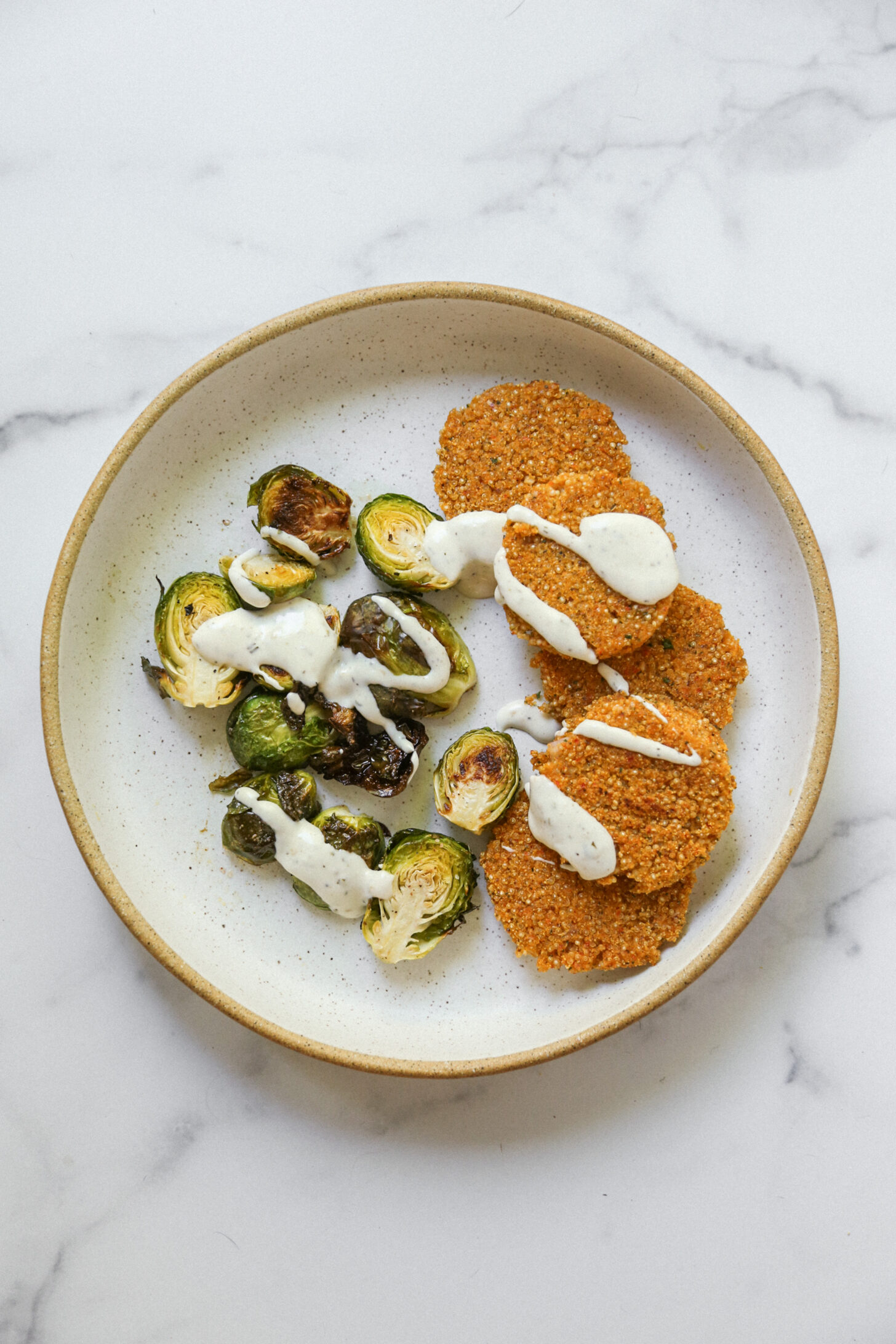 crispy quinoa cakes and brussels sprouts