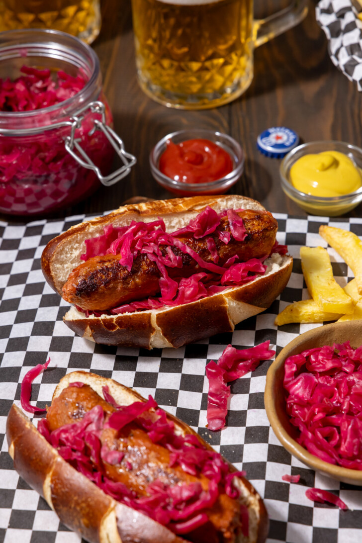 bratwurst sandwich with pink sauerkraut