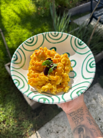 huancaina mac and cheese with olives and parsley