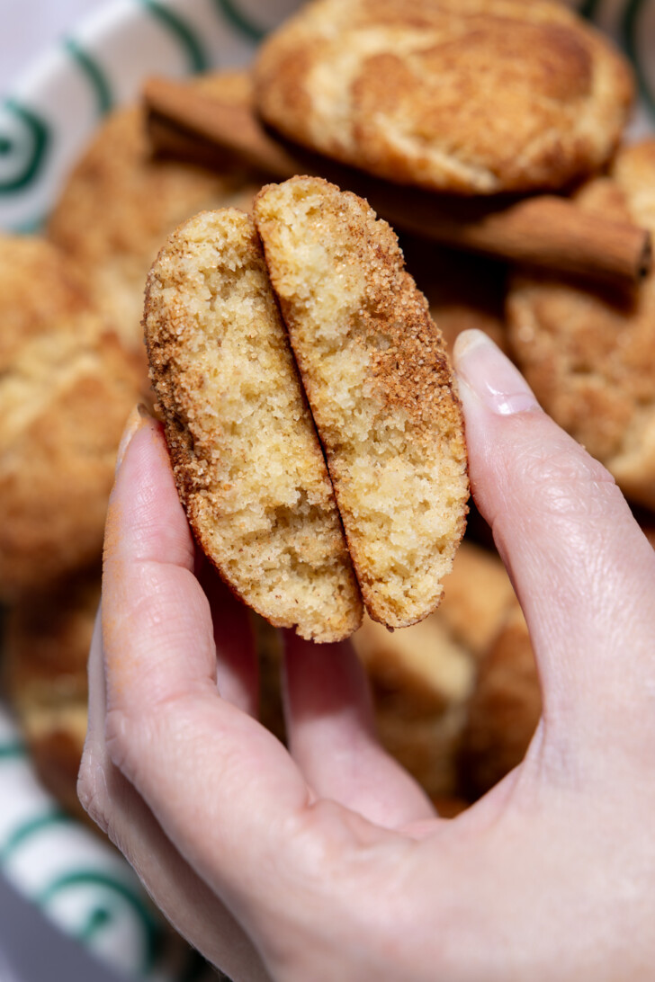 Inside of a soft vegan snickerdoodle cookie showing the fluffy center